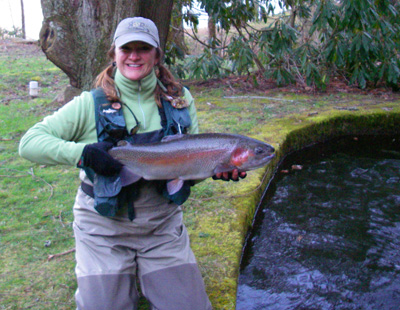 Charity Rutter with trophy rainbow trout in North Carolina