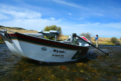Charity Rutter parks her drift boat to wade a nice spot on the Madison