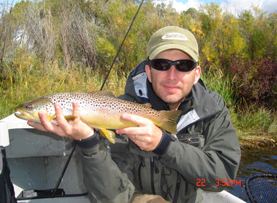 Peter Petruzzi shows a nice Madison brown trout near Ennis, Montana