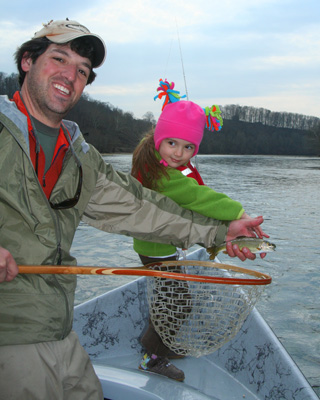Daaaaad! Don't take your picture with my fish!