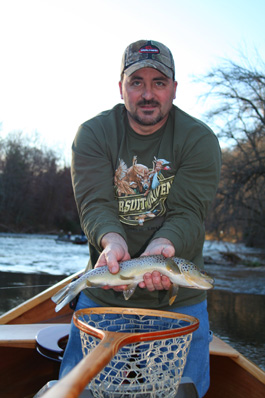 Tuckaseegee Brown Don Heaton shows off an 18" brown that took a streamer