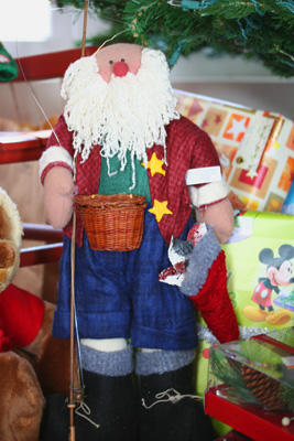 You decide: Cute Santa decoration or unrepentant poacher. Notice where he keeps the fish bigger than the slot limit