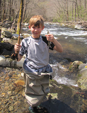 Miles Duncan of Knoxville shows off his first trout in the Smoky Mountains
