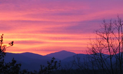 Sunrise over the world headquarter of R & R Fly Fishing in the Smokies. That's the silhouette of Mount Leconte in the distance.