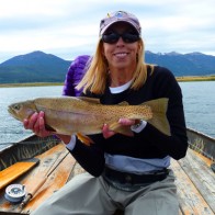 Ladawn Ostmann on Henry's Lake Ladawn Ostmann with a monster cutt-bow on Henry's Lake