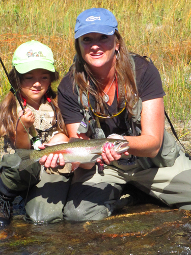 Yellowstone Rainbow Mother & daughter with a nice rainbow trout